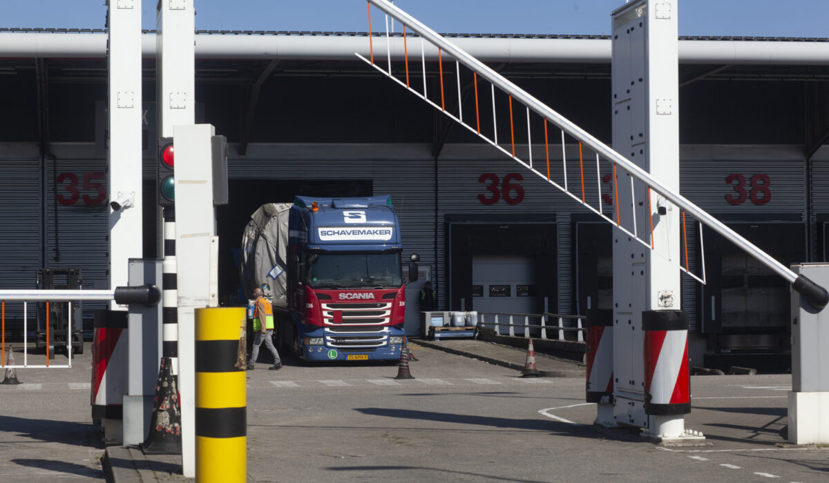 A truck being checked at a numbered cargo dock at Schiphol